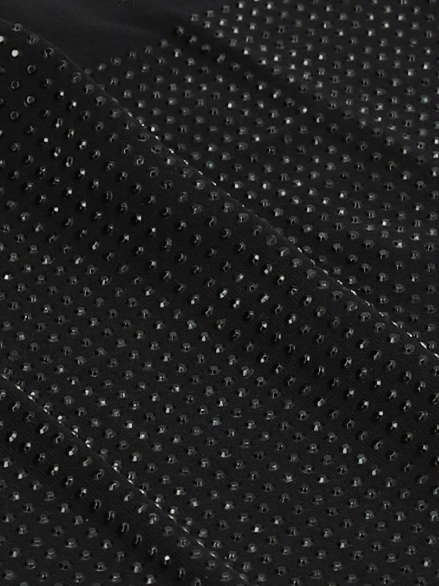 Hosiery by Wolford for women in polyamide 7 sequins black features an sultry finish from the Women's Polyamide 7 Sequins Hosiery collection, offering a sultry silhouette for an elegant and refined look.