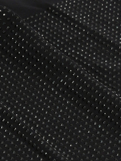 Hosiery by Wolford for women in polyamide 7 sequins black features an sultry finish from the Women's Polyamide 7 Sequins Hosiery collection, offering a sultry silhouette for an elegant and refined look.