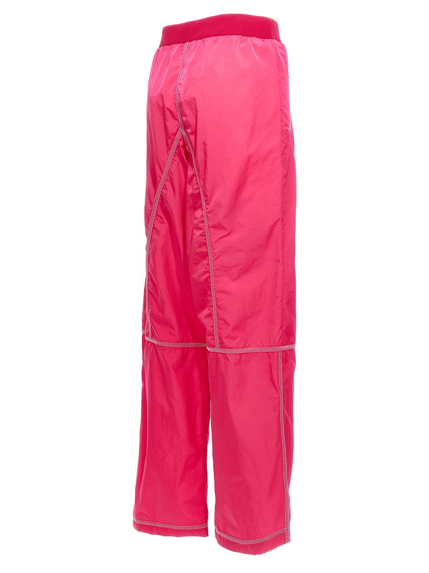 Activewear Pants by Tom Ford for women in nylon fuchsia & print features an versatile silhouette, integrating performance-ready with a versatile athletic, long, and .
