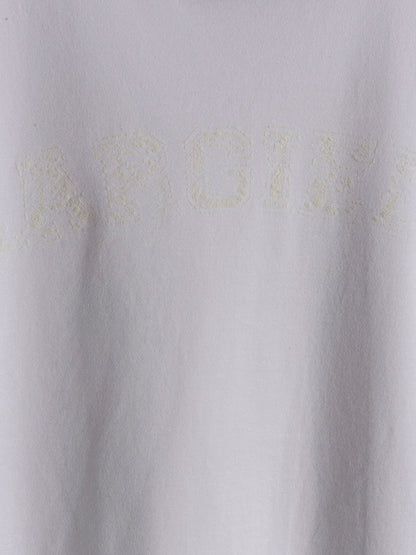 T-Shirt by Maison Margiela for women in cotton white & print features an edgy silhouette, meticulously detailed with a sophisticated and for a truly edgy finish.