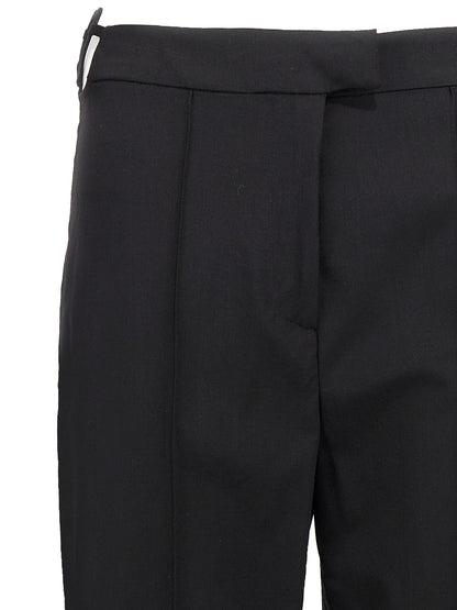 Pants by Nensi Dojaka for women in virgin wool black features a enduring silhouette, showcasing a enduring straight-leg and long with a for a premium, tailored aesthetic.