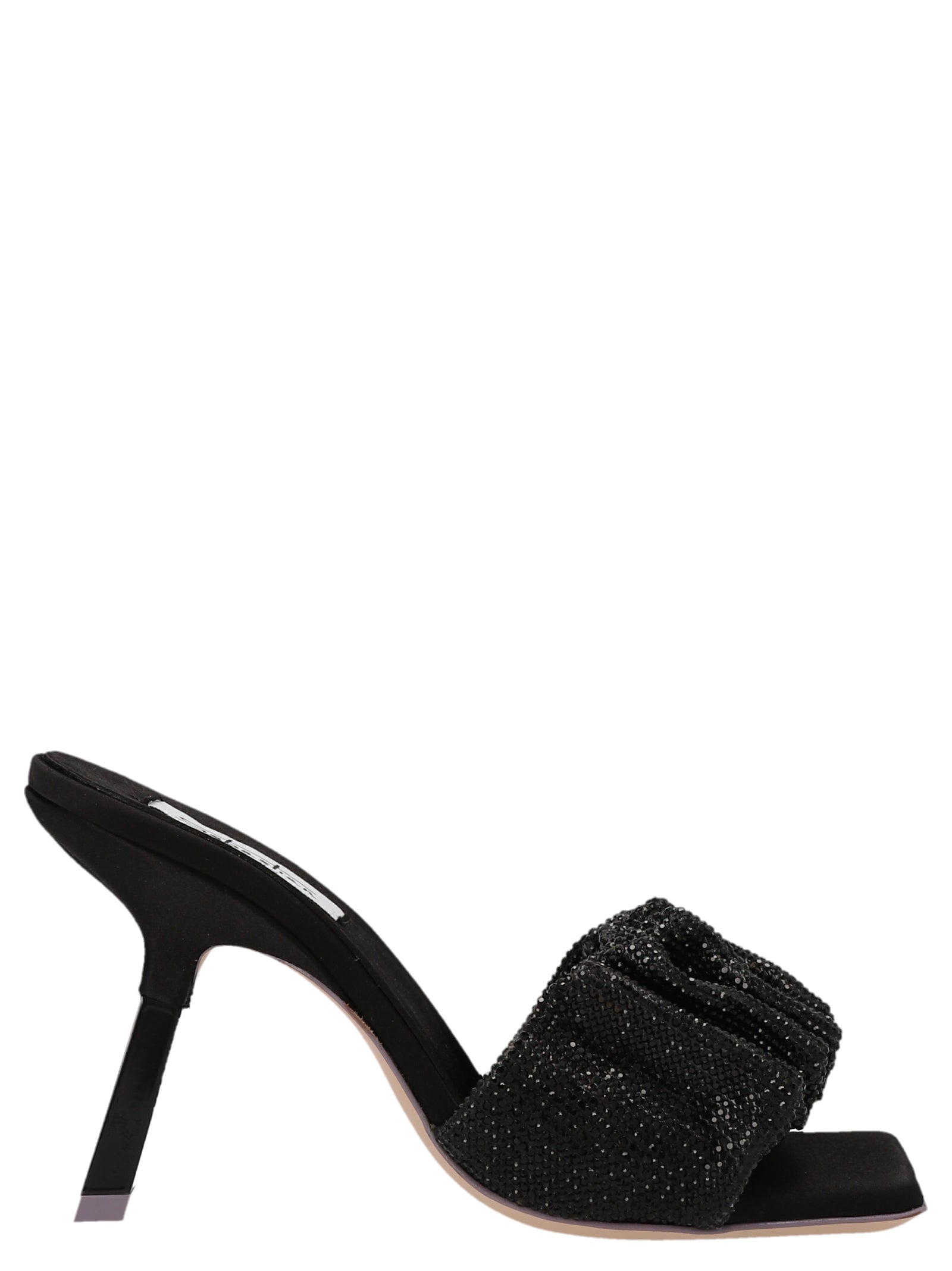 Stiletto Mules Sandals by SEBASTIAN for women in goatskin leather & sequins black features an architectural design from the Women's Goatskin leather & Sequins Stiletto Mules Sandals collection, defined by a architectural stiletto and for a architectural finish.