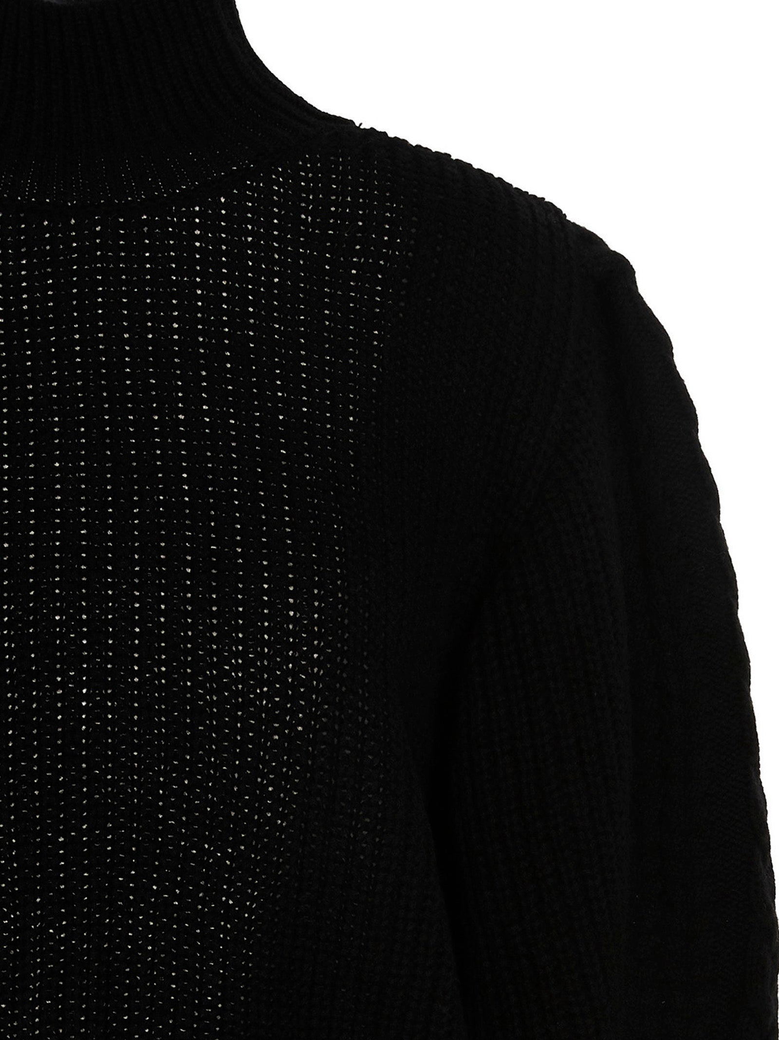Cardigan by MIXIK for women in wool black showcases a luxurious silhouette, meticulously detailed with a sophisticated and for a refined finish.