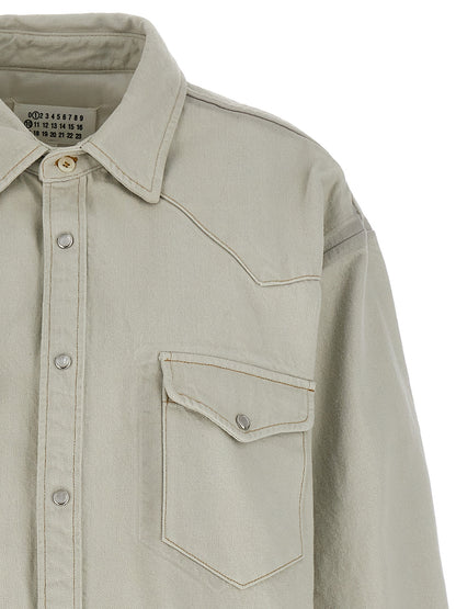Trucker Jacket by Maison Margiela for women in denim cotton white features a dramatic silhouette, showcasing a sophisticated and distinctive pockets & insulated for a dramatic aesthetic.