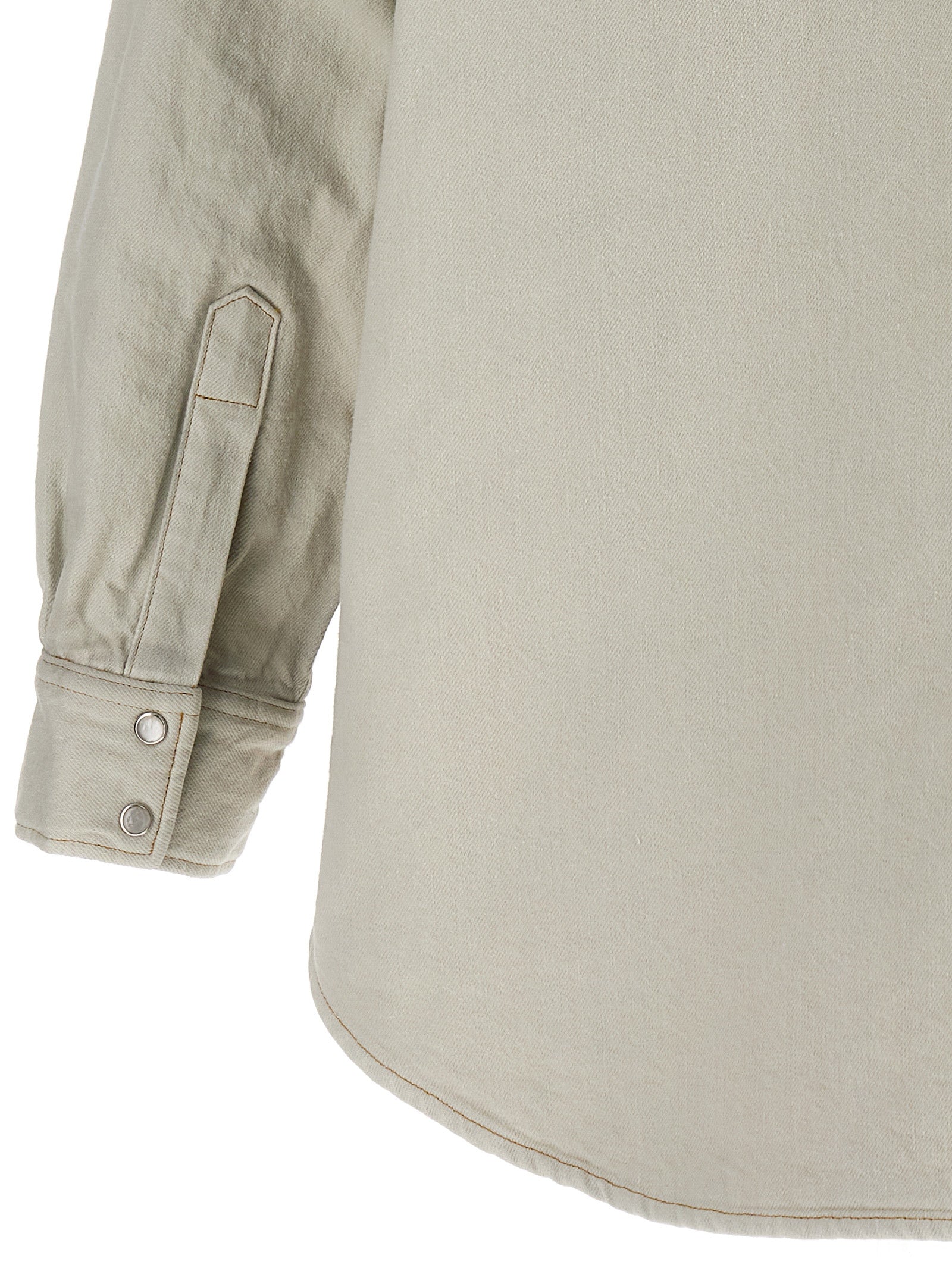 This Trucker Jacket by Maison Margiela for women in denim cotton white exhibits a edgy silhouette, meticulously detailed with functional pockets & insulated and a edgy for a edgy finish.