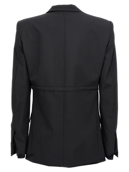 Tuxedo by Nensi Dojaka for women in virgin wool black presents a distinguished silhouette, showcasing a sophisticated and a distinguished that epitomizes formal elegance.