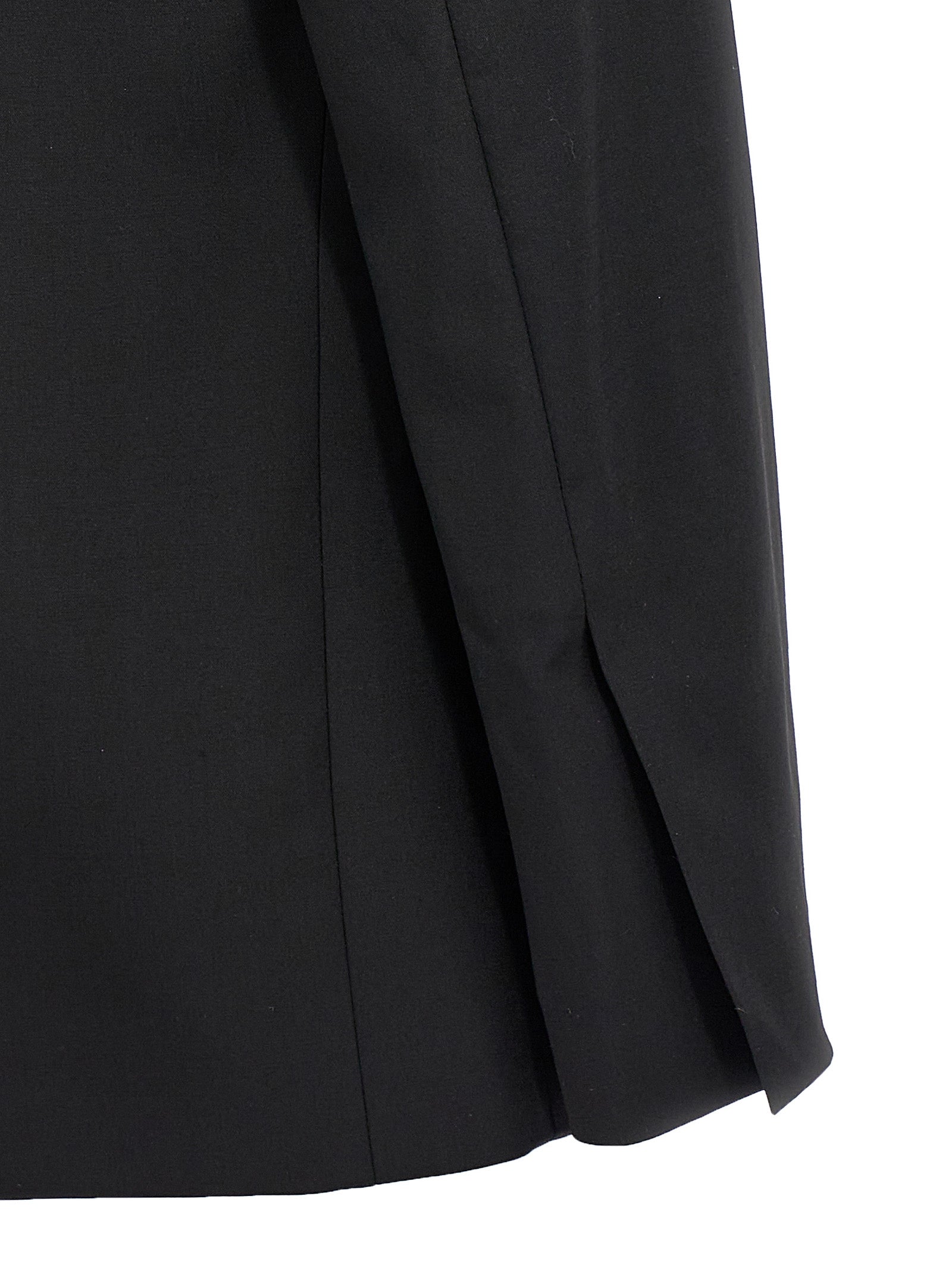 This Tuxedo by Nensi Dojaka for women in virgin wool black presents a highly glamorous silhouette, featuring a highly glamorous and a highly glamorous that ensures a highly glamorous finish for any formal occasion.