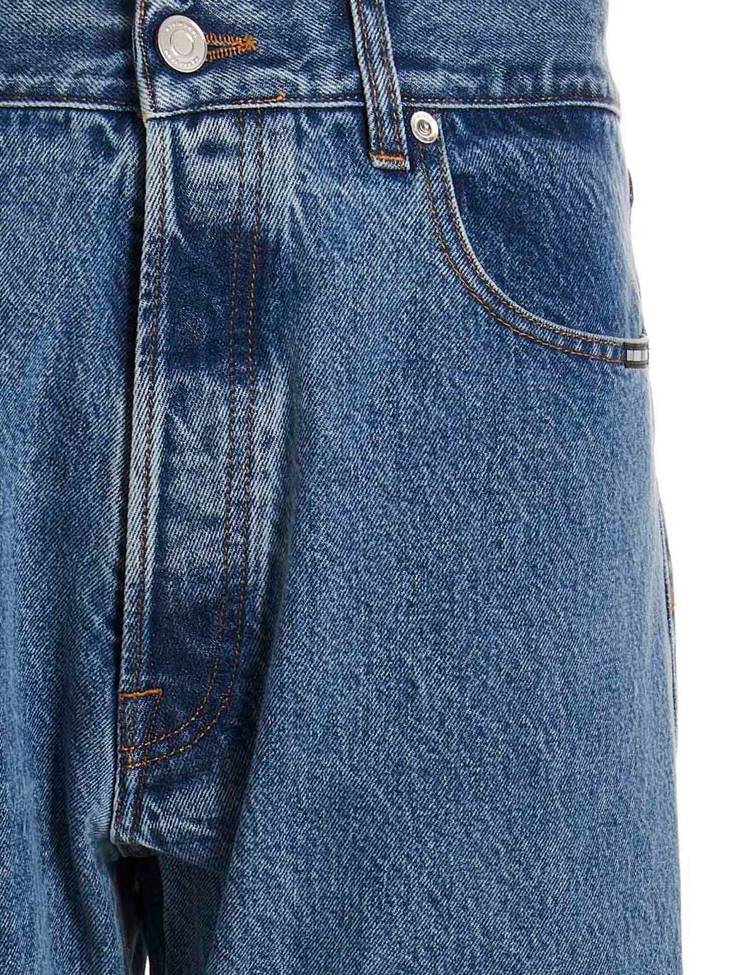 Jeans by VTMNTS for men in denim cotton blue presents a tailored silhouette, showcasing a tailored straight-leg, relaxed-fit & oversized and long cut with a refined for a truly tailored aesthetic.