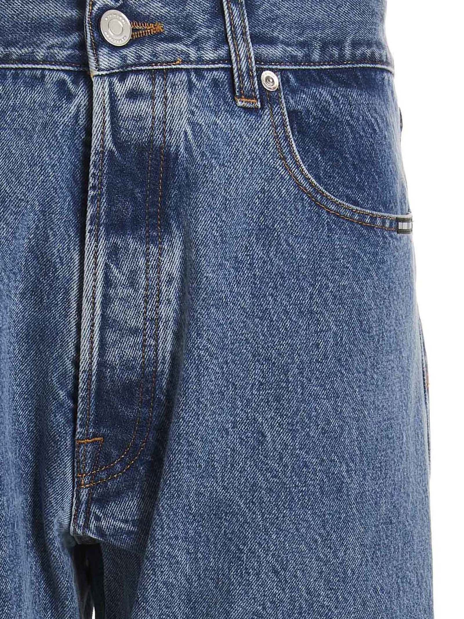 Jeans by VTMNTS for men in denim cotton blue presents a tailored silhouette, showcasing a tailored straight-leg, relaxed-fit & oversized and long cut with a refined for a truly tailored aesthetic.