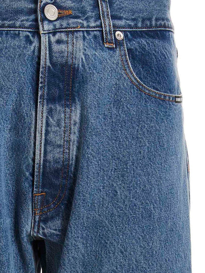 Jeans by VTMNTS for men in denim cotton blue presents a tailored silhouette, showcasing a tailored straight-leg, relaxed-fit & oversized and long cut with a refined for a truly tailored aesthetic.