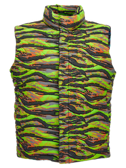 Vest by ERL for men in cotton multicolor, patterned & camouflage showcases a utilitarian silhouette, artfully incorporating pockets & insulated and a utilitarian high-collar neckline for a truly utilitarian finish.