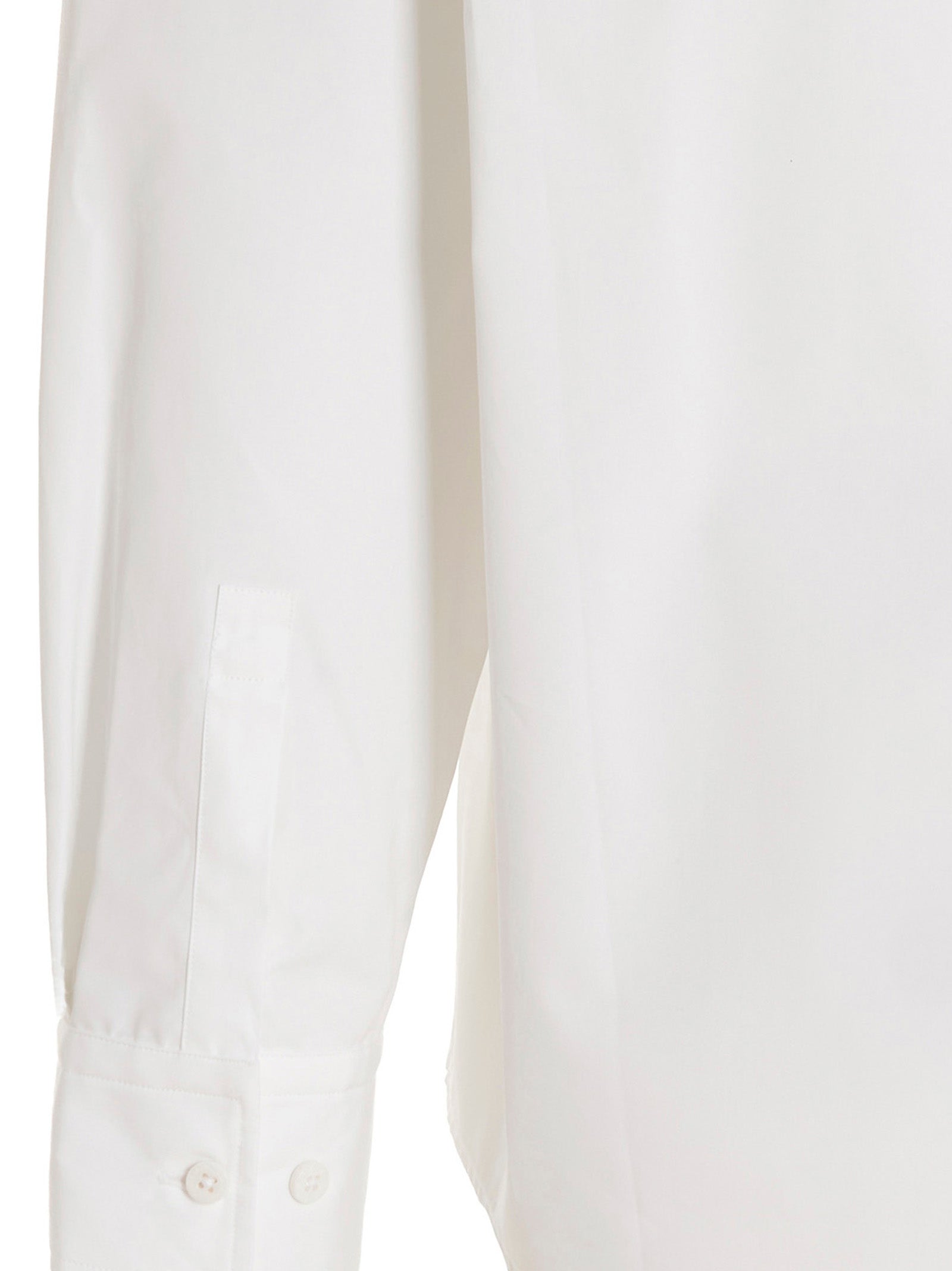 Shirt by VTMNTS for men in cotton white & print showcases a sublime silhouette, artfully detailed with a sublime and for a sophisticated, sublime finish.