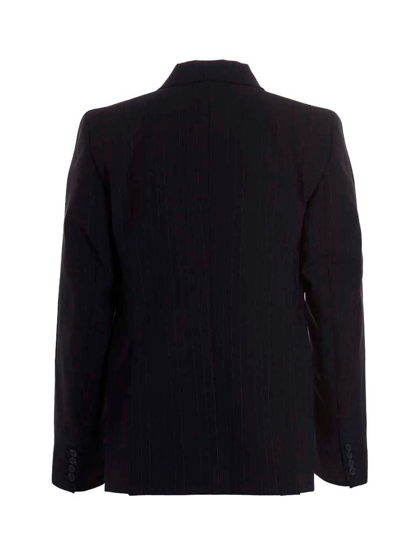 This Blazer by VTMNTS for men in virgin wool blue & multicolor presents a tailored silhouette, meticulously tailored with a tailored and distinctive for a tailored finish.