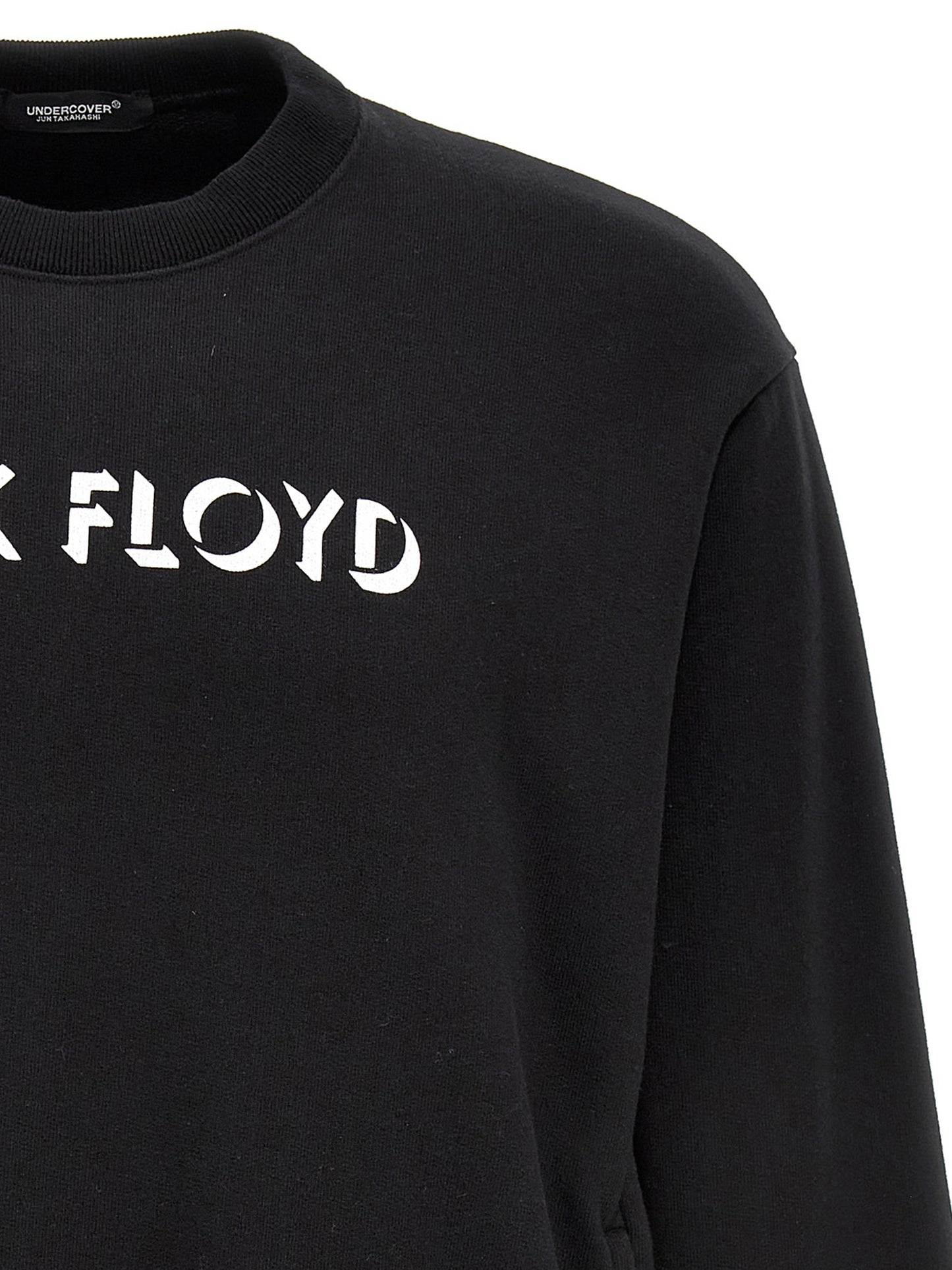 Sweatshirt by Undercover for men in cotton bicolour, black, pink, white & print showcases a slouchy chic silhouette, artfully detailed with a slouchy chic and for a slouchy chic finish.