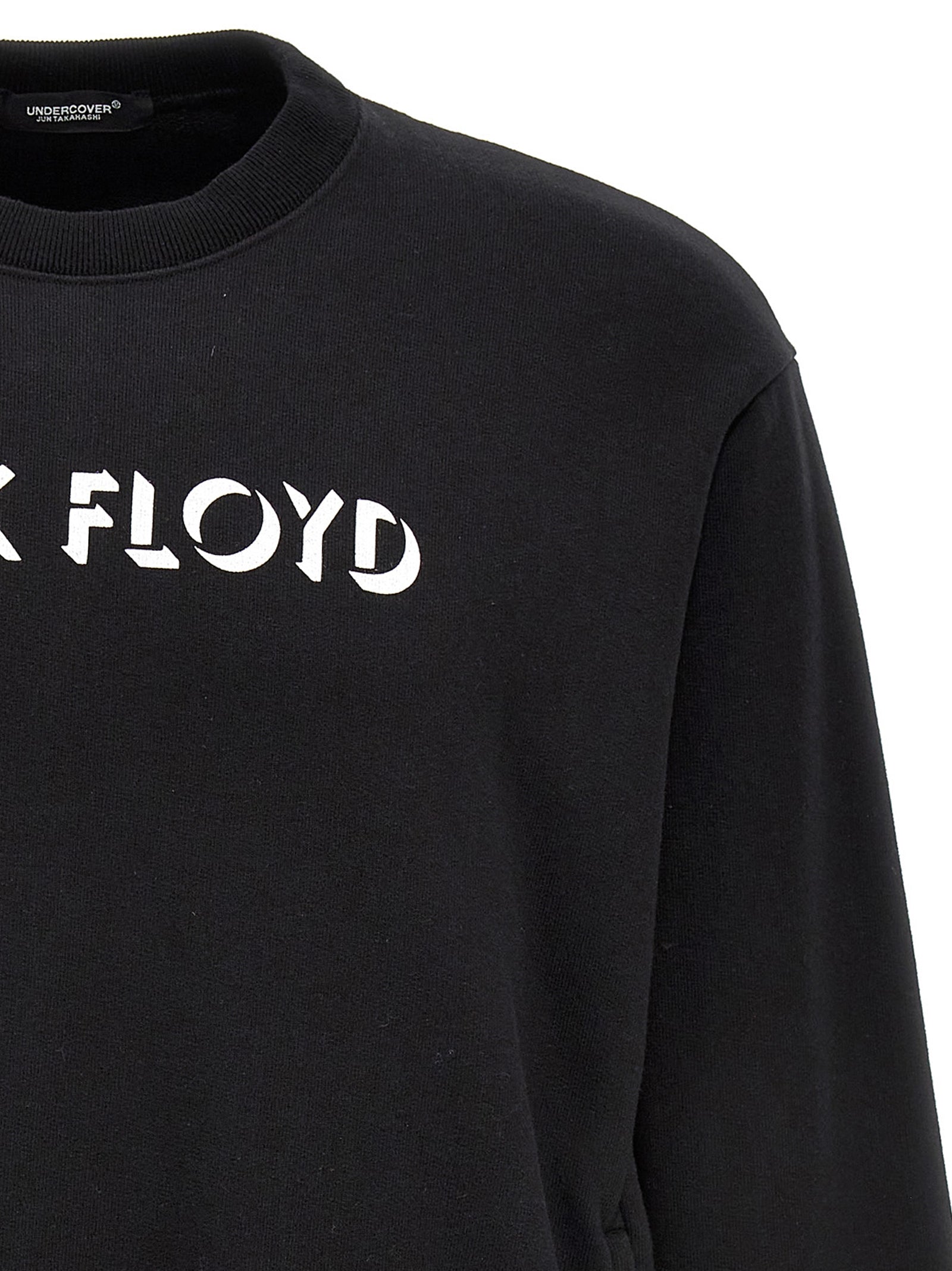 Sweatshirt by Undercover for men in cotton bicolour, black, pink, white & print showcases a slouchy chic silhouette, artfully detailed with a slouchy chic and for a slouchy chic finish.