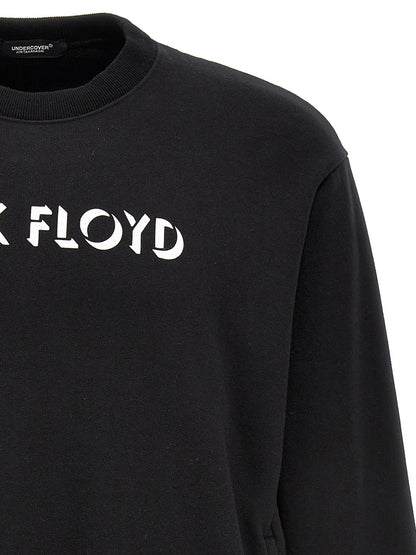 Sweatshirt by Undercover for men in cotton bicolour, black, pink, white & print showcases a slouchy chic silhouette, artfully detailed with a slouchy chic and for a slouchy chic finish.