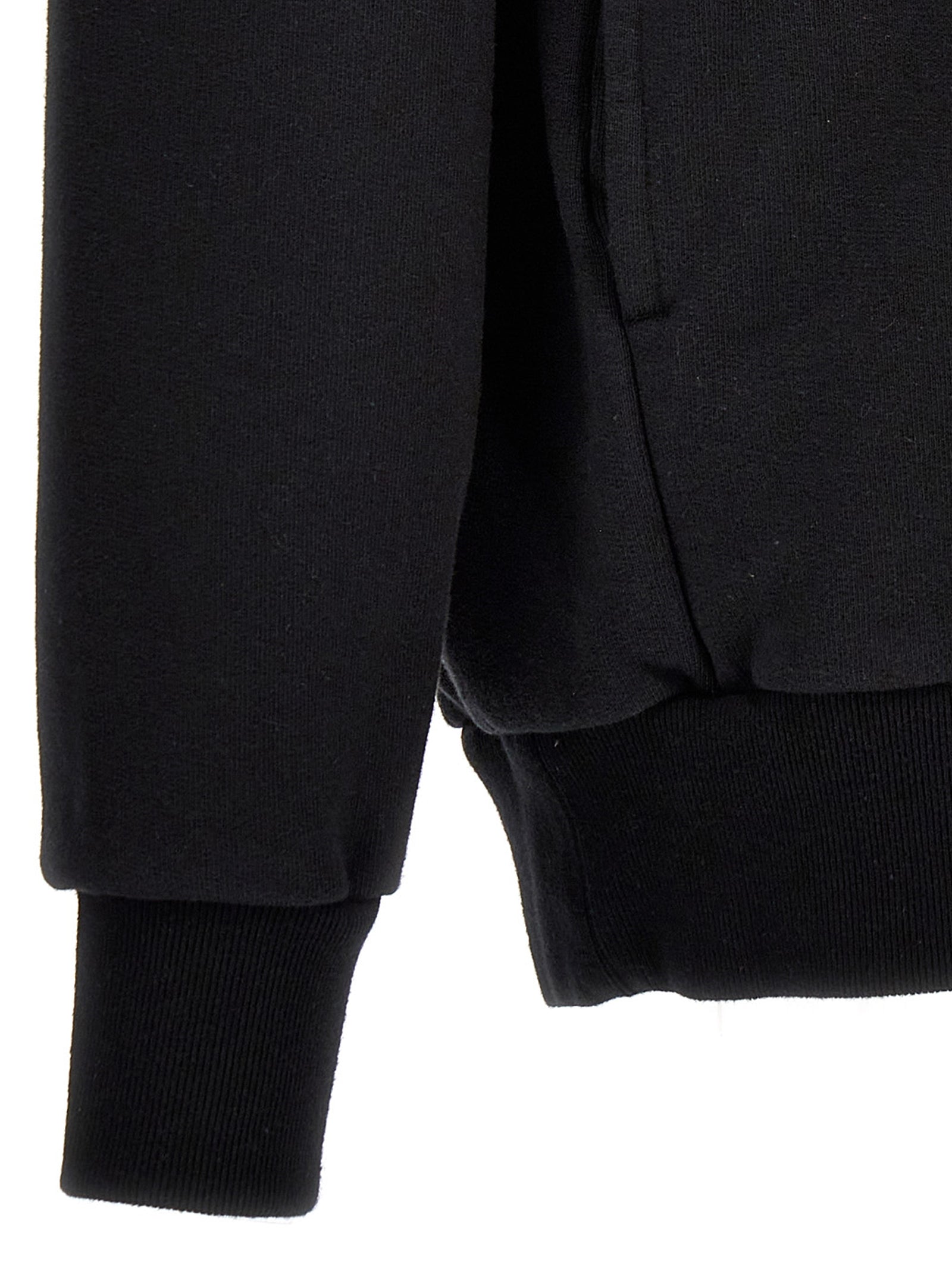 Sweatshirt by Undercover for men in cotton bicolour, black, pink, white & print presents a smart casual silhouette, featuring a smart casual and for a sophisticated look.