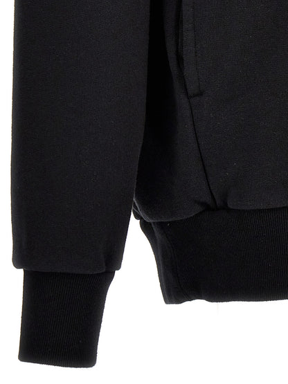 Sweatshirt by Undercover for men in cotton bicolour, black, pink, white & print presents a smart casual silhouette, featuring a smart casual and for a sophisticated look.