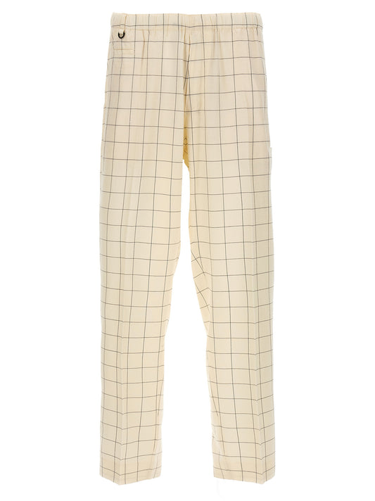 Casual Pants by Undercover for men in rayon silk bicolour, black, white & checkered features an sartorial and long with a cut for a sartorial finish.