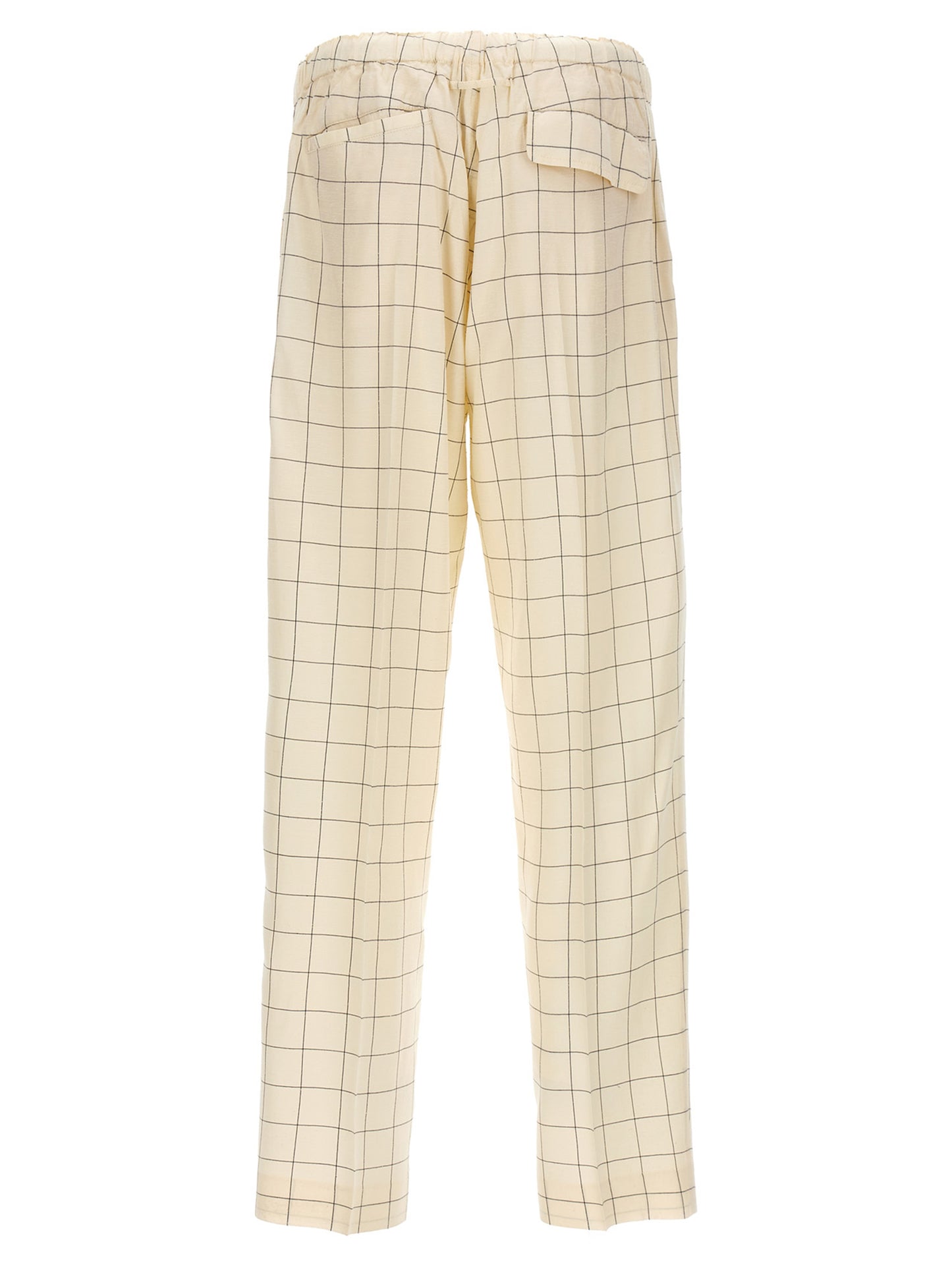 Casual Pants by Undercover for men in rayon silk bicolour, black, white & checkered features a refined silhouette with a refined , defined by a and a refined long for a refined finish.