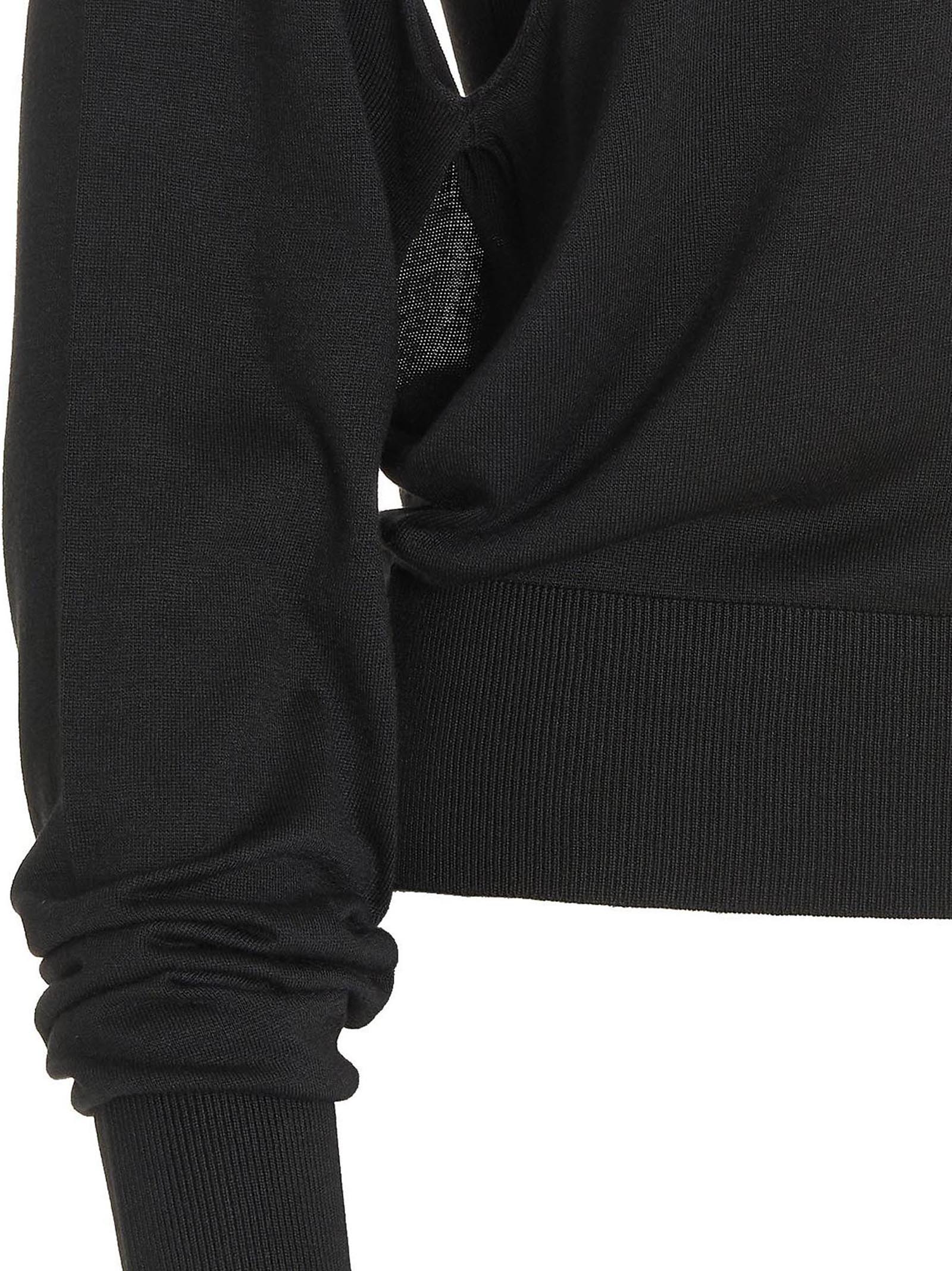 Cardigan by RAMAEL for women in silk black showcases a captivating silhouette, artfully detailed with a captivating and for a truly sophisticated captivating look.