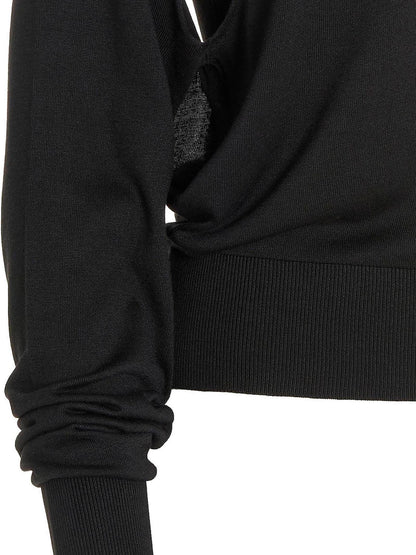 Cardigan by RAMAEL for women in silk black showcases a captivating silhouette, artfully detailed with a captivating and for a truly sophisticated captivating look.