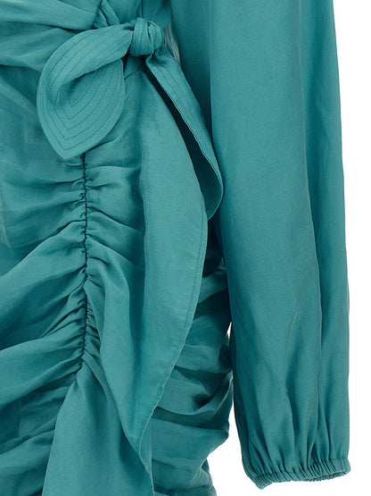 Skirt by Ungaro for women in light-blue features an tailored silhouette, artfully capturing the essence of Flow Women's Lyocell Mini Skirt in a sophisticated mini.
