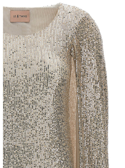 Dress by LE TWINS for women in cashmere polyester & sequins silver features an sultry silhouette defined by a and , falling to an sultry short for a sultry look.