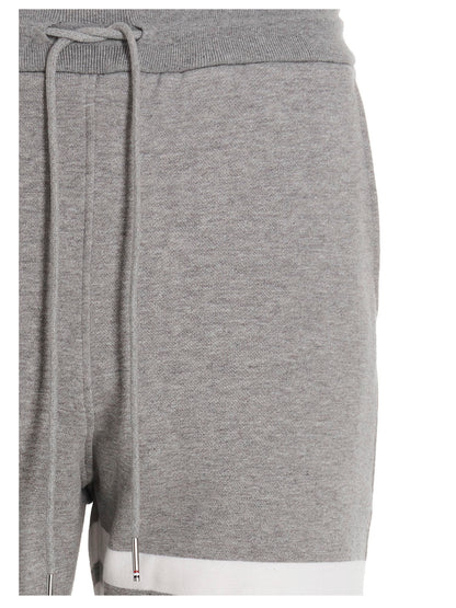 Joggers by Thom Browne for men in cotton gray features an refined tailoring silhouette, showcasing a premium with a and long cut for a refined tailoring look.