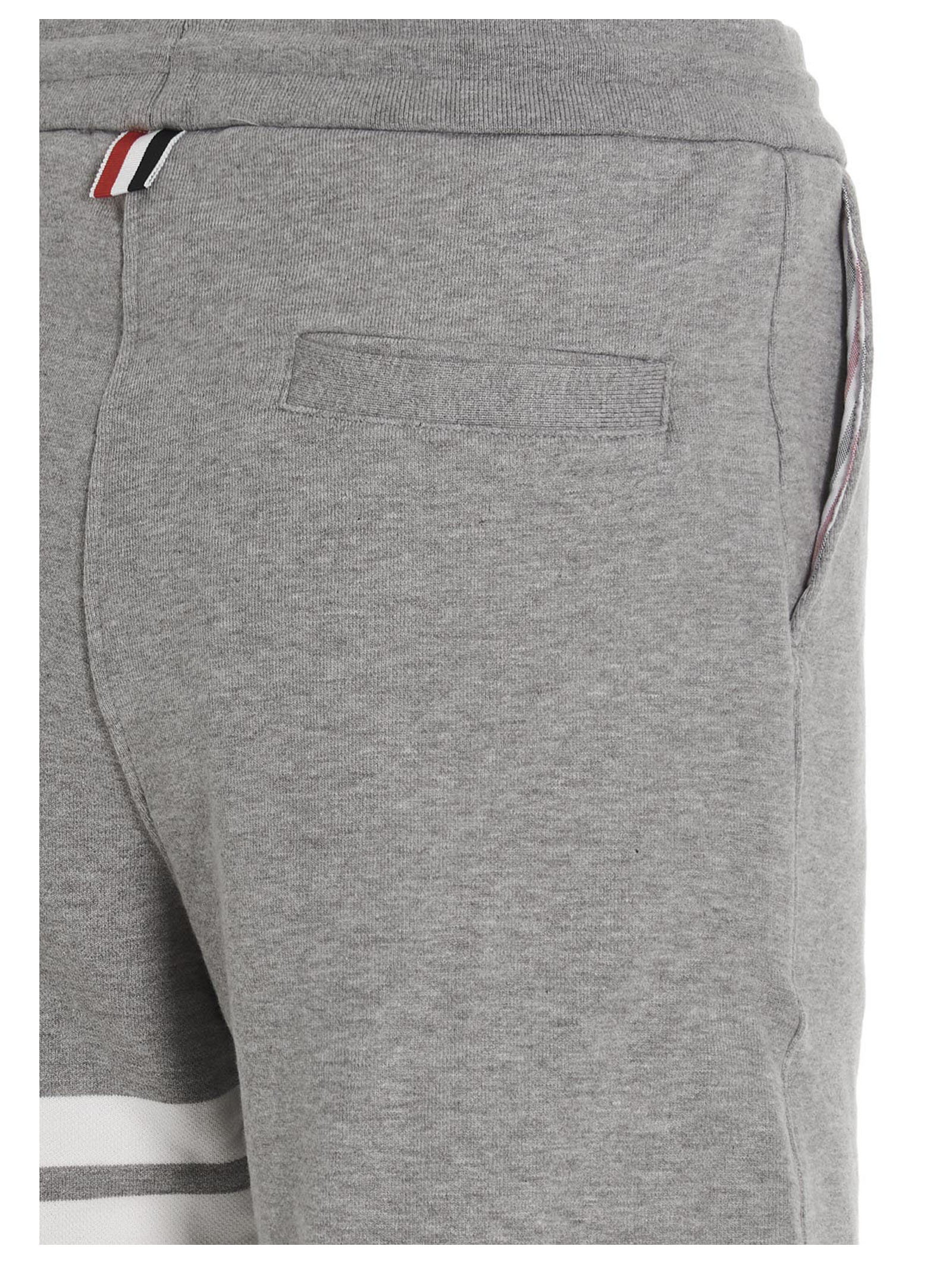 Joggers by Thom Browne for men in cotton gray features an sartorial and long with a cut for a sartorial finish.