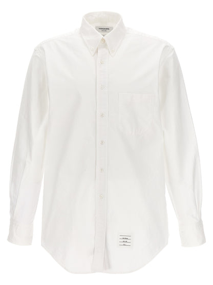 Shirt by Thom Browne for men in cotton white showcases a sleek silhouette, elegantly detailed with a sleek and for a sleek finish.