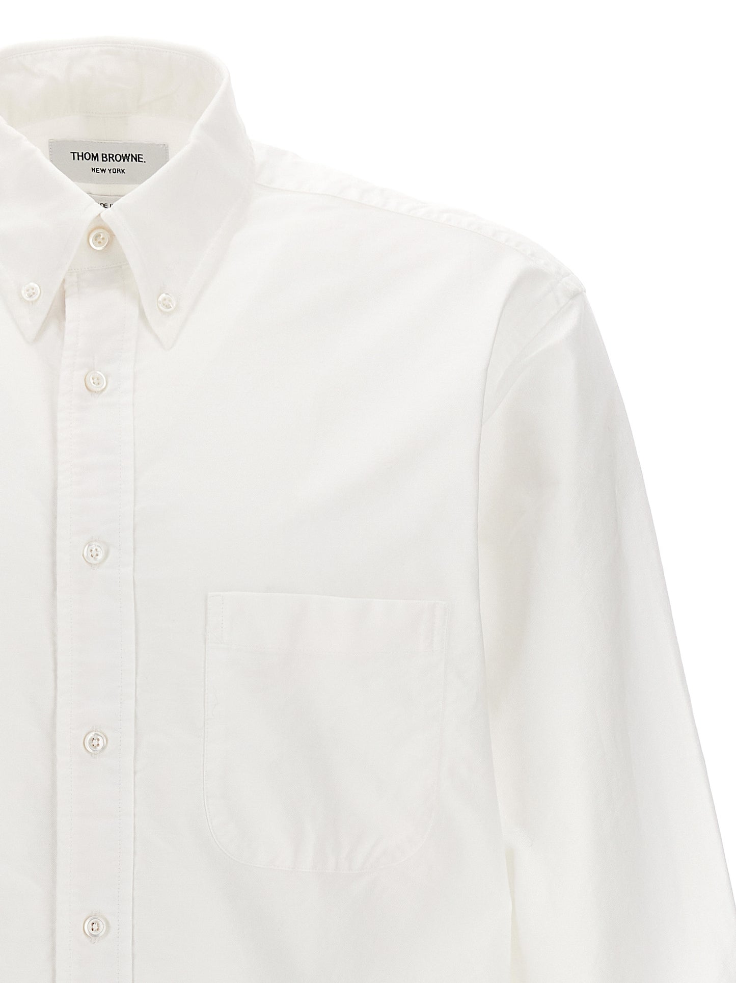 Shirt by Thom Browne for men in cotton white, featuring a nuanced and nuanced for a sophisticated finish.
