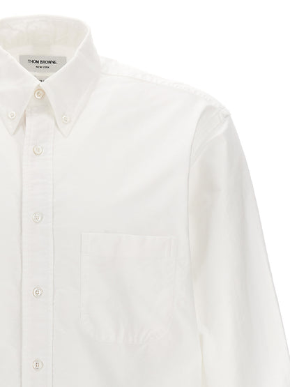 Shirt by Thom Browne for men in cotton white, featuring a nuanced and nuanced for a sophisticated finish.