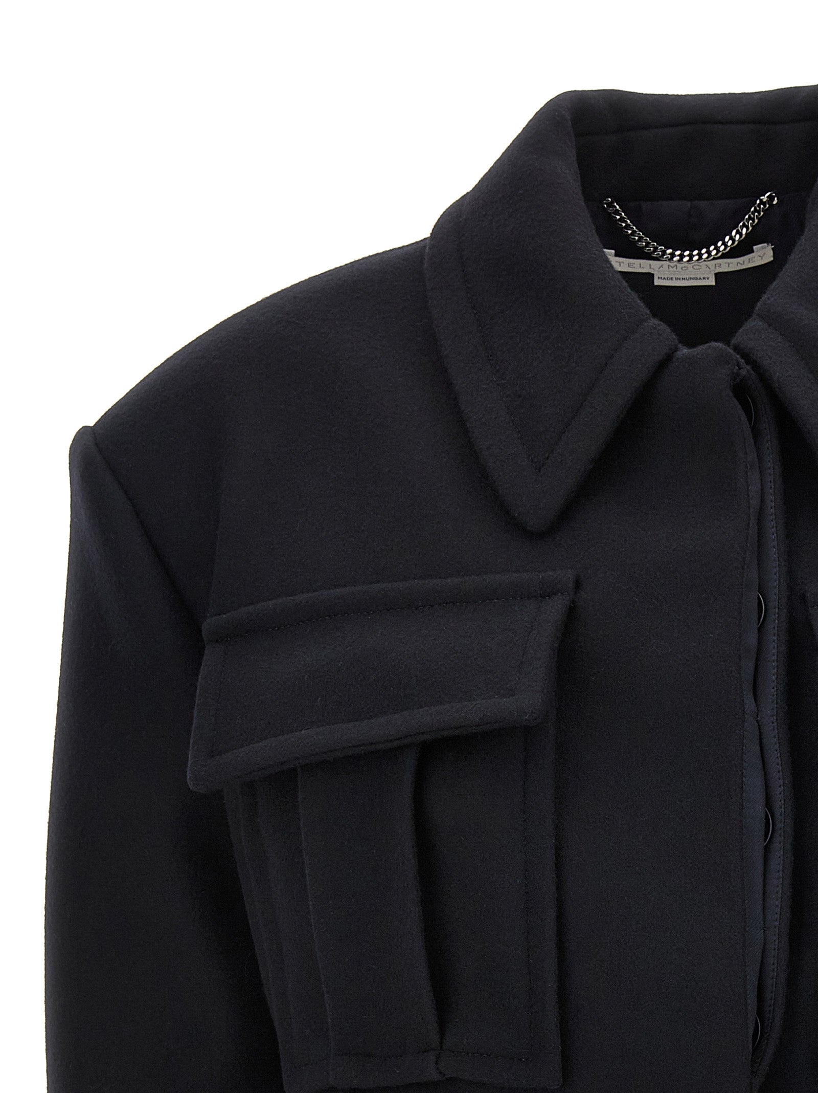 Overcoat by Stella McCartney for women in wool black features a contemporary silhouette showcasing a contemporary and refined pockets for a sophisticated finish.