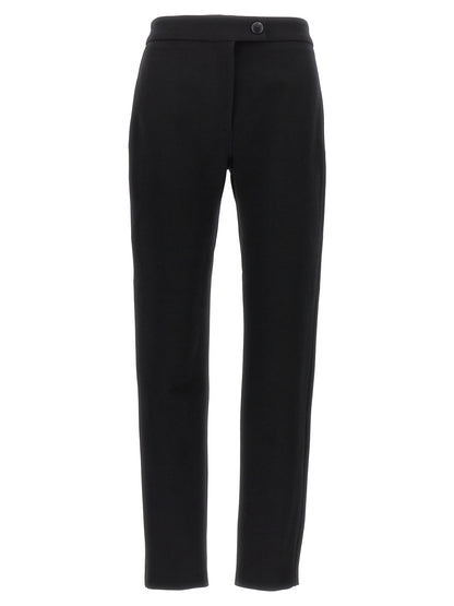 Trousers by Ferragamo for women in polyester & wool black features a sculptural silhouette, showcasing a sculptural skinny-leg & skinny and long with a sophisticated for a sculptural finish.