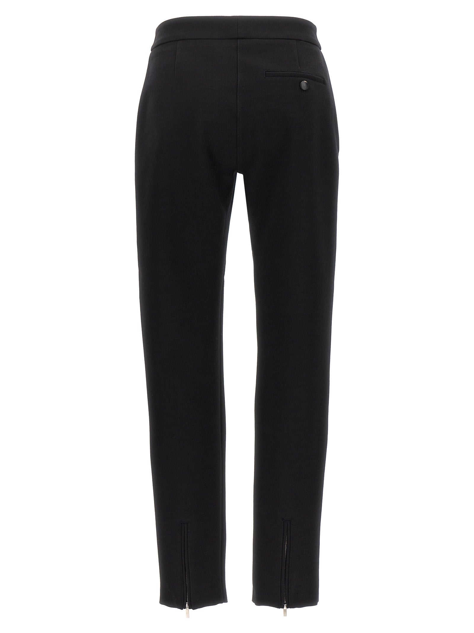 Trousers by Ferragamo for women in polyester & wool black features a tailored silhouette with a tailored skinny-leg & skinny, defined by its long and a sophisticated .