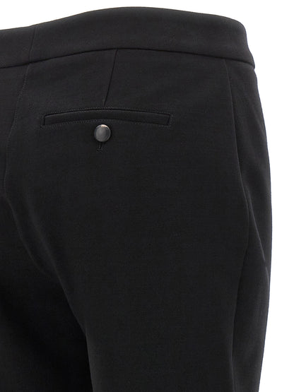 Trousers by Ferragamo for women in polyester & wool black features a artisanal silhouette, showcasing a sophisticated skinny-leg & skinny with a long and for a artisanal finish.