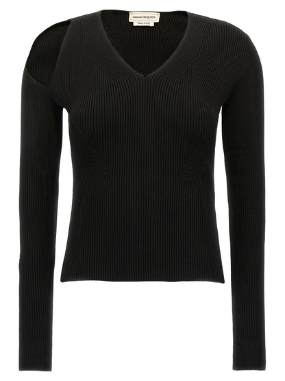 Cardigan by Alexander McQueen for women in wool & polyester black showcases a luxurious silhouette, meticulously detailed with a sophisticated v-neck neckline and long-sleeve for a refined finish.