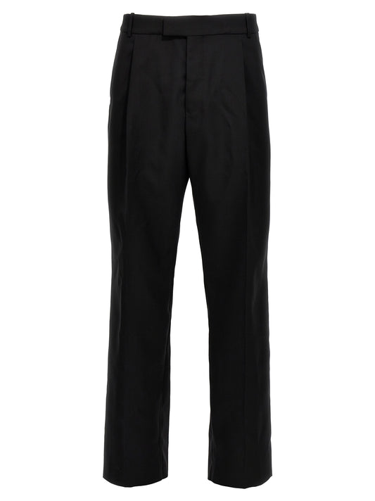 Trousers by Alexander McQueen for men in wool black features an on trend silhouette, showcasing a sophisticated with a long and for an on trend finish.