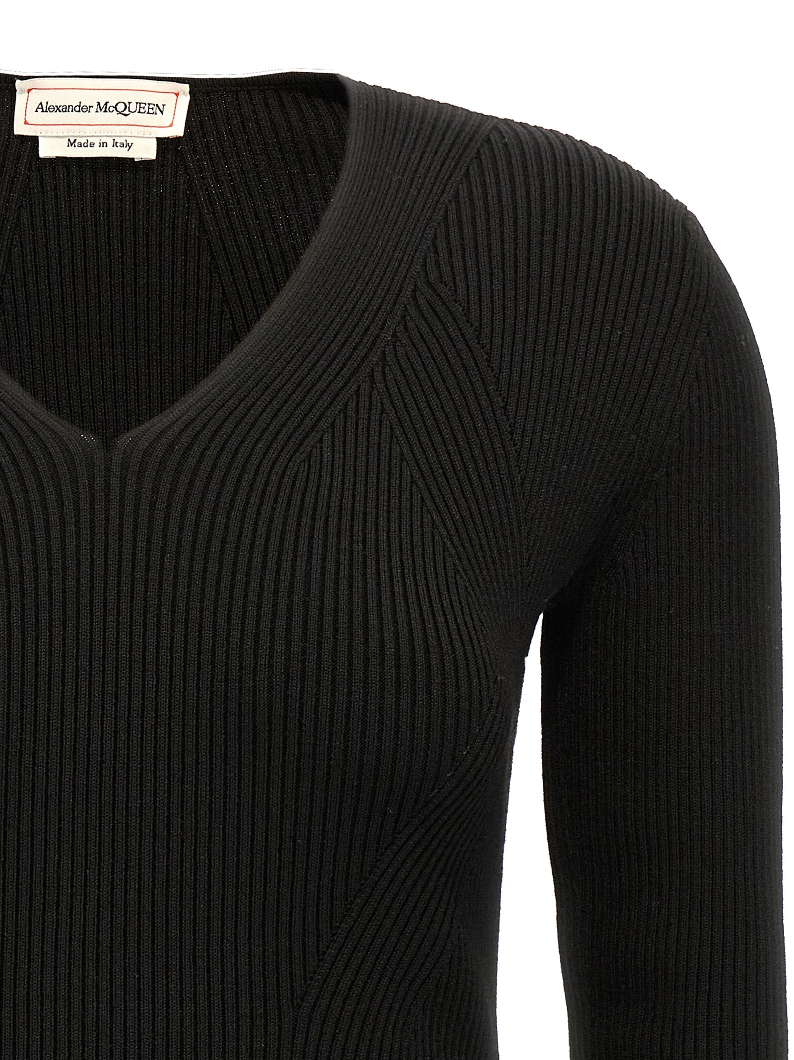 Cardigan by Alexander McQueen for women in wool & polyester black features a nuanced silhouette with a refined v-neck neckline and nuanced detailing for a sophisticated look.