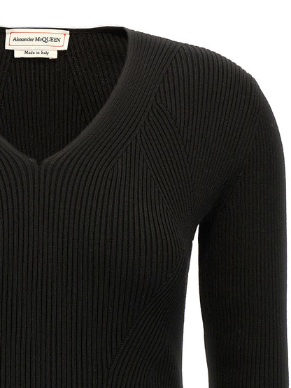 Cardigan by Alexander McQueen for women in wool & polyester black features a nuanced silhouette with a refined v-neck neckline and nuanced detailing for a sophisticated look.