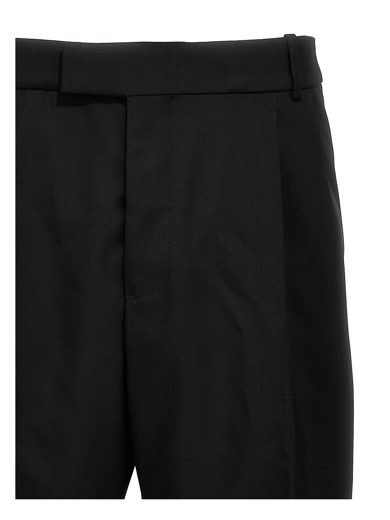 Trousers by Alexander McQueen for men in wool black features a tailored silhouette with a tailored , defined by its long and a sophisticated .