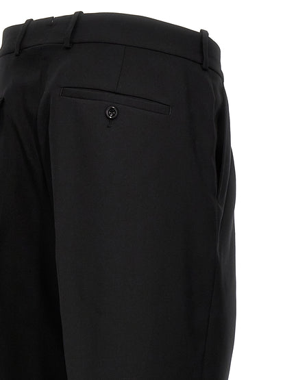 Trousers by Alexander McQueen for men in wool black features an sartorial silhouette, showcasing a precise and long with a sartorial for a refined look.