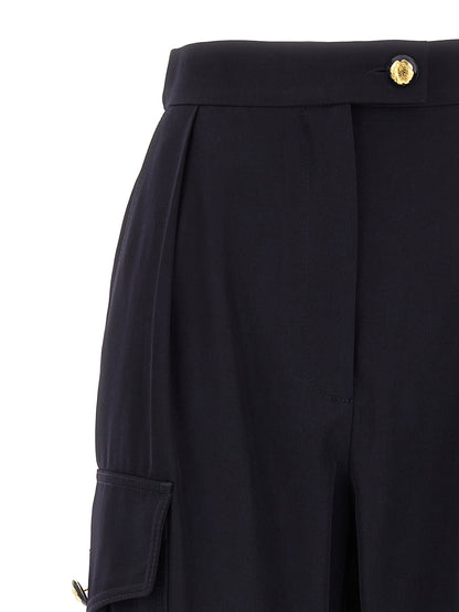 Cargo Pants by Alexander McQueen for women in wool cotton blue presents a on trend silhouette, artfully finished with a on trend , long, and for a sophisticated look.