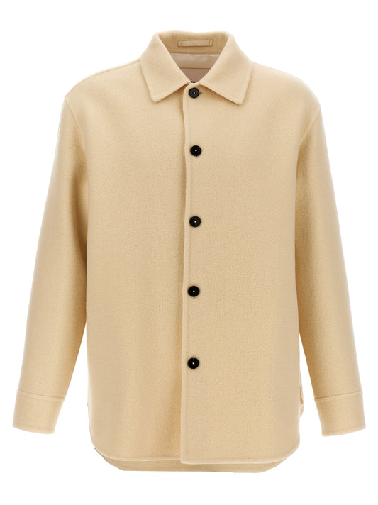 Overcoat by Jil Sander for men in virgin wool beige features an voluminous silhouette, showcasing distinct pockets and a voluminous for a truly voluminous aesthetic.