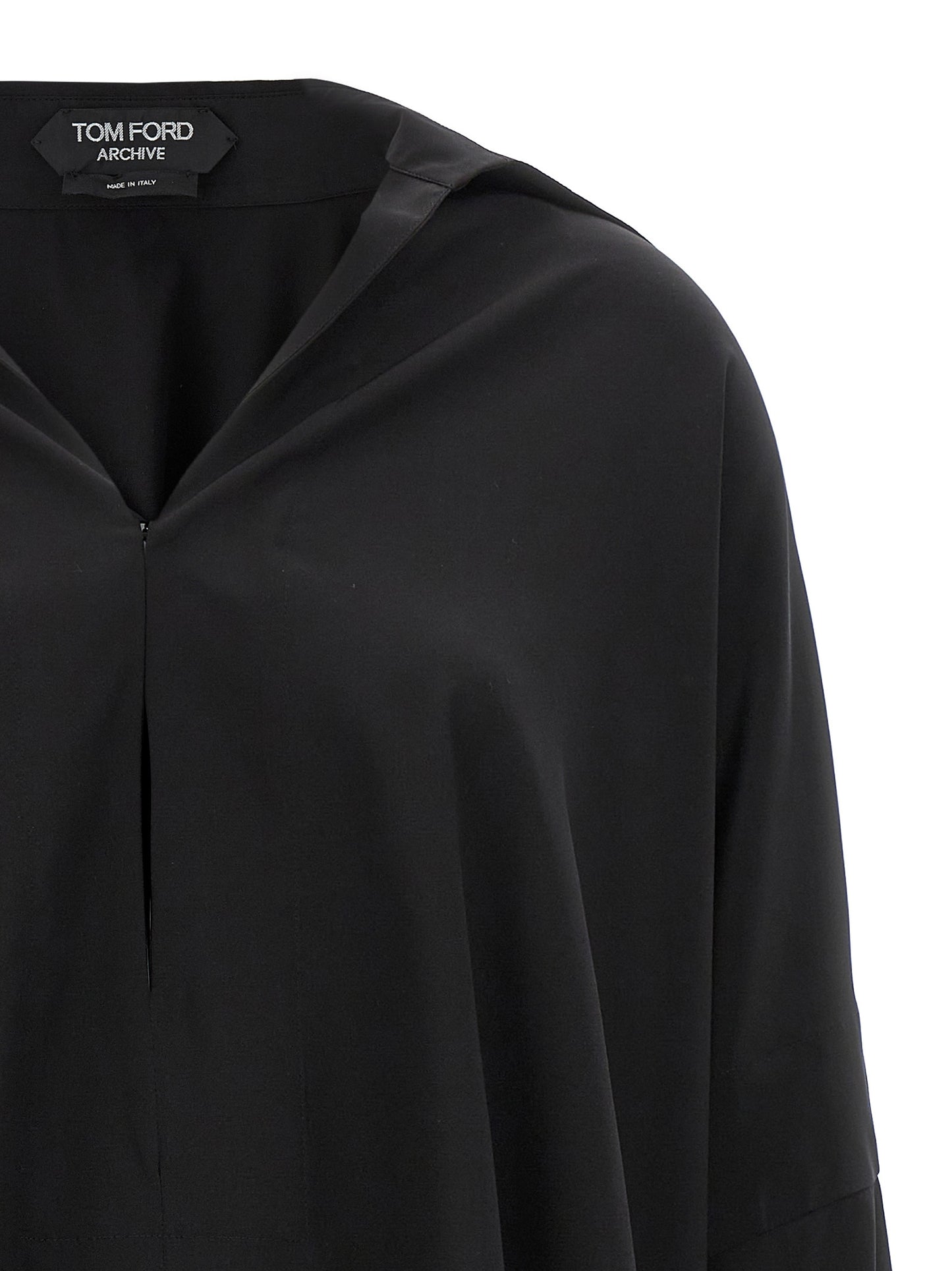 Blouse by Tom Ford for women in silk crepe black showcases a sharp silhouette, elegantly detailed with a sharp and sharp .
