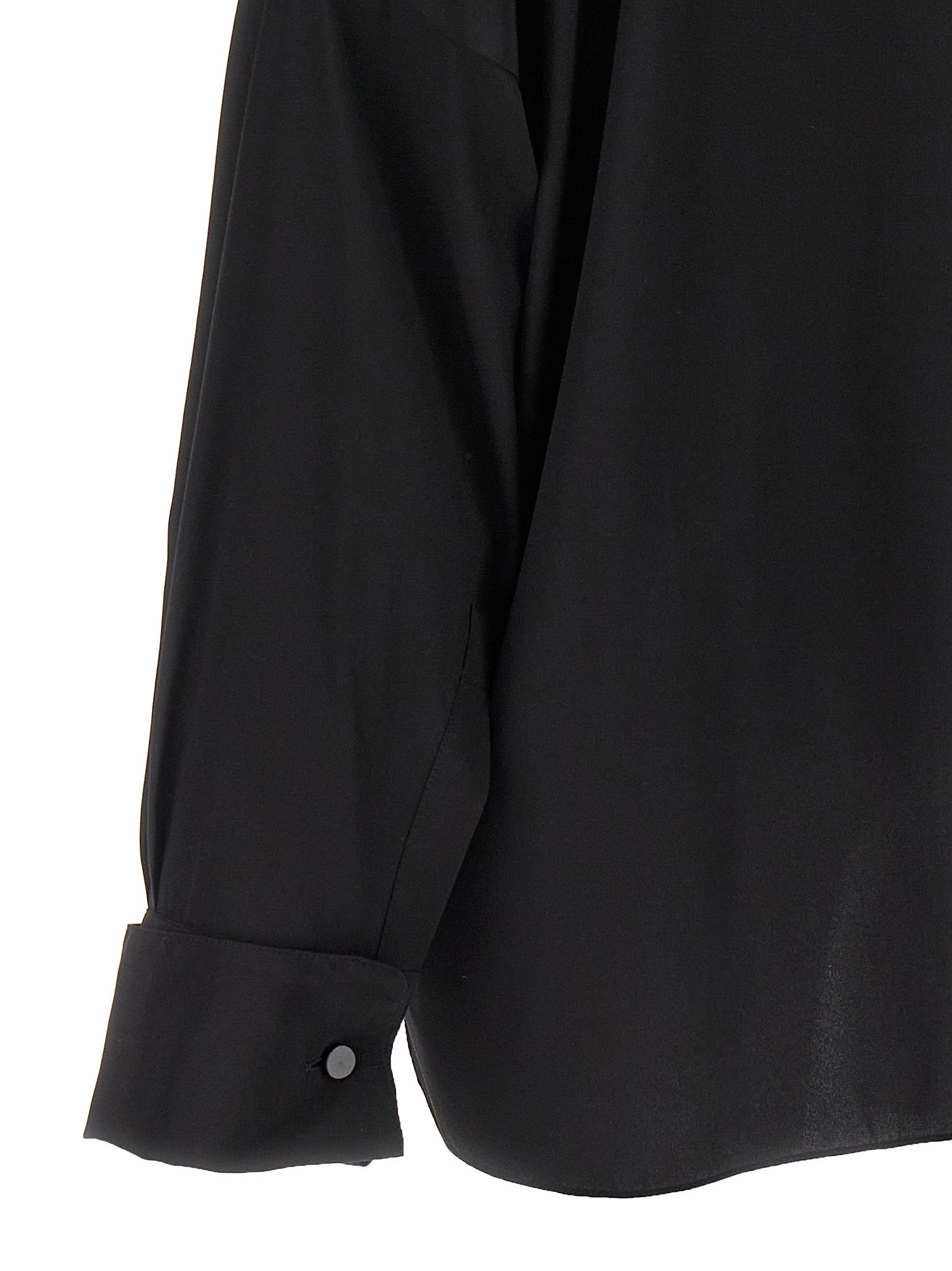 Blouse by Tom Ford for women in silk crepe black showcases a sleek silhouette, elegantly detailed with a sleek and for a sleek finish.