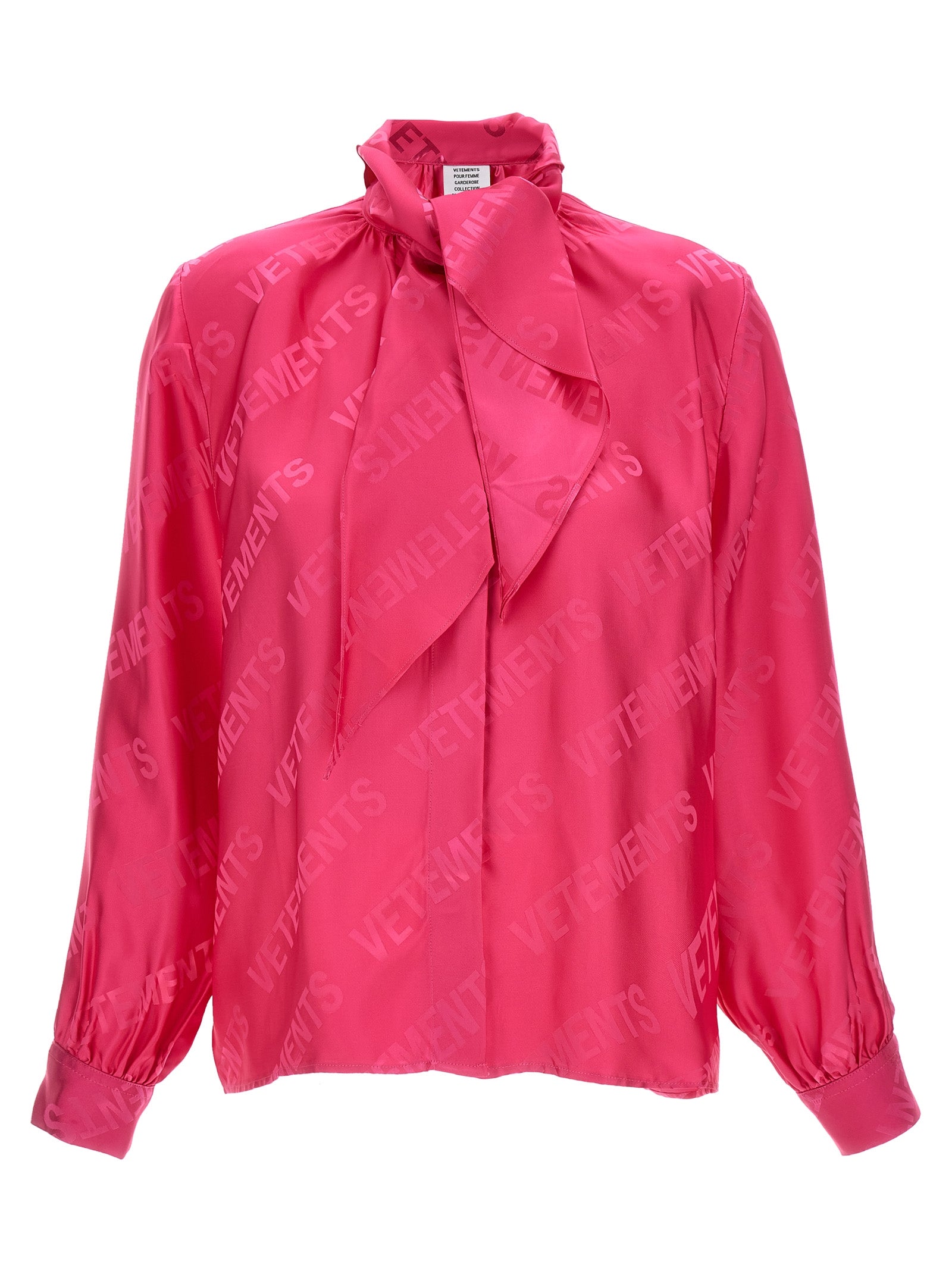 Blouse by Vetements for women in viscose fuchsia, jacquard & monogram features an architectural silhouette with a refined and elegant for a architectural look.