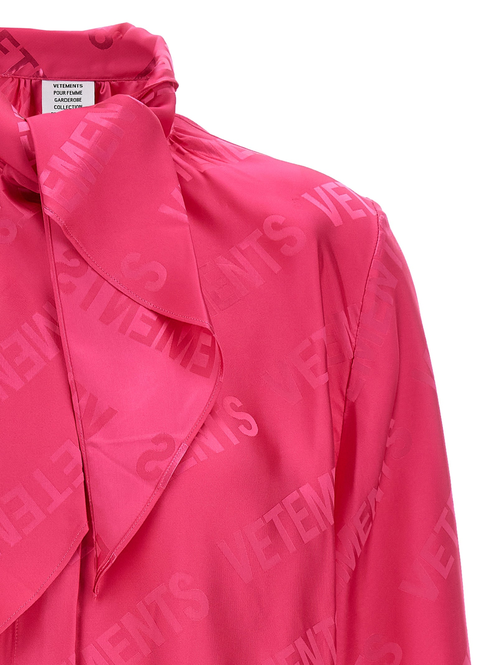 Blouse by Vetements for women in viscose fuchsia, jacquard & monogram features an polished silhouette, showcasing a sophisticated and detail for a truly polished finish.