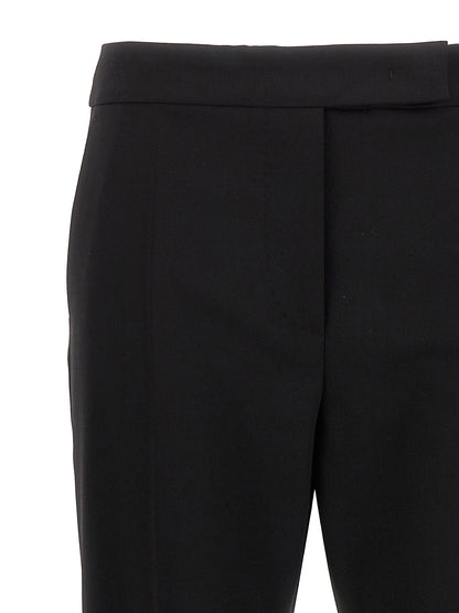 Trousers by Max Mara for women in satin mohair virgin wool black features a tailored silhouette with a tailored , defined by its long and a sophisticated .